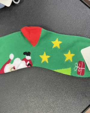 CALCETINES VERDES CON ESTRELLAS Y SANTA $45