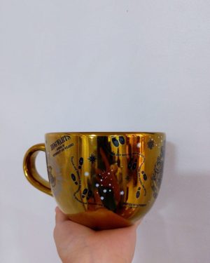 TAZOTA DE HOGWARTS DORADA $280