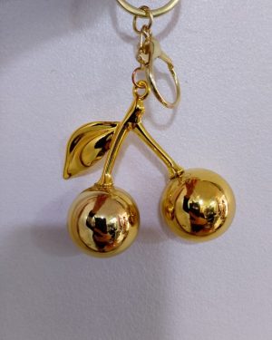 LLAVERO CEREZA DORADO $120