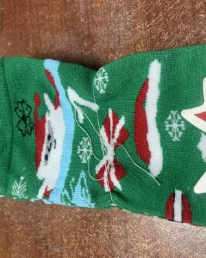 CALCETINES VERDES CON SANTA CLAUS Y TRÉBOL $45