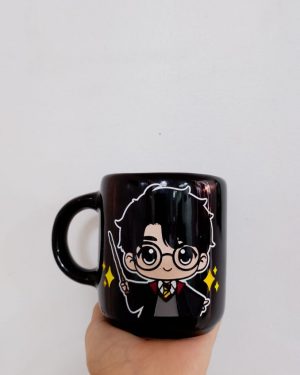 TAZA NEGRA HARRY POTTER CON BRILLOS $245